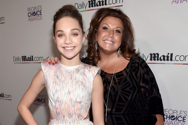 <p>Alberto E. Rodriguez/Getty</p> Maddie Ziegler (left) and Abby Lee Miller (right) attend an event together in 2016.