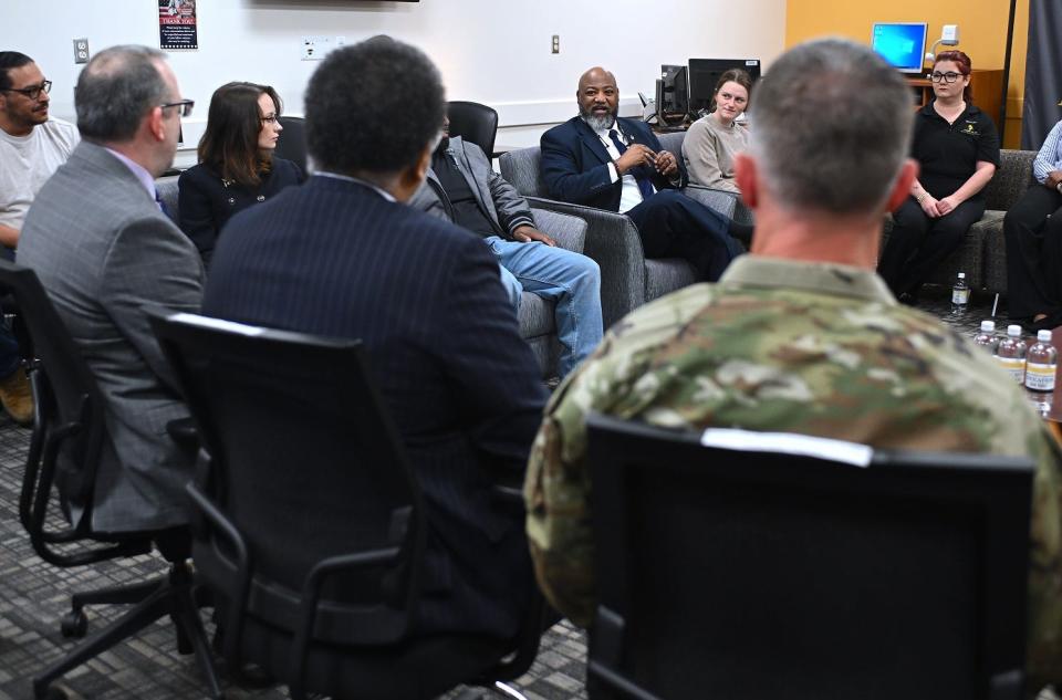 Ronnie Hutchins speaks during a discussion about cybersecurity education and jobs on Wednesday, March 20, 2024, at the Tony Rand Center at Fayetteville Technical Community College. Hutchins is a retired Fayetteville Police Department Human Trafficking Detective and is a former Army Blackhawk helicopter pilot. He is studying cybersecurity at FTCC. Harry Coker Jr., the White House National Cyber Director visited FTCC to talk cybersecurity jobs and to hear from people like Hutchins.