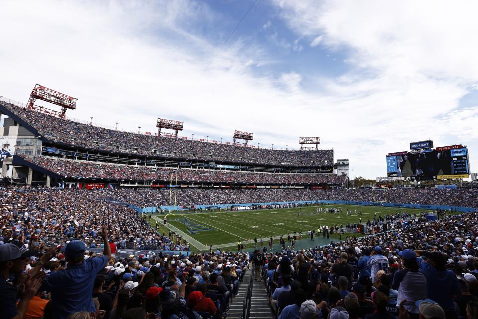 FILE - Fans pack Nissan Stadium as the Tennessee Titans play the Indianapolis Colts, Sunday, Oct. 23, 2022, in Nashville, Tenn. The Titans will be moving to a new stadium for the 2027 season, and they're taking the current name with them under a new 20-year naming rights deal with Nissan North America, the team announced Friday, Nov. 17, 2023. (AP Photo/Wade Payne, File)