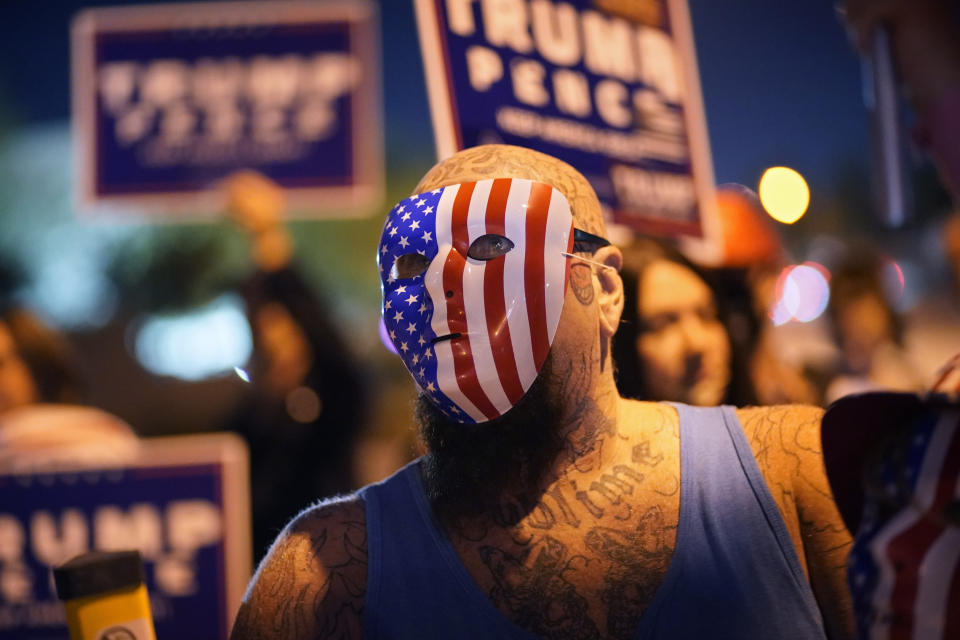 Supporters of President Donald Trump protest the Nevada vote in front of the Clark County Election Department, Wednesday, Nov. 4, 2020, in Las Vegas. (AP Photo/John Locher)