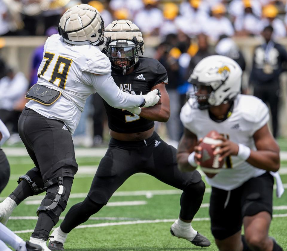 Alabama State University defensive end Stephon Young-Rolle (9) works against lineman Elijah Baker (78) during the Black and Gold Spring Game at ASU Stadium on the ASU campus in Montgomery, Ala., on Saturday April 6, 2024.