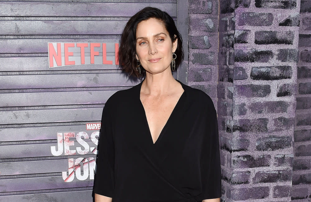 Carrie-Anne Moss will feature in 'Die Alone' credit:Bang Showbiz
