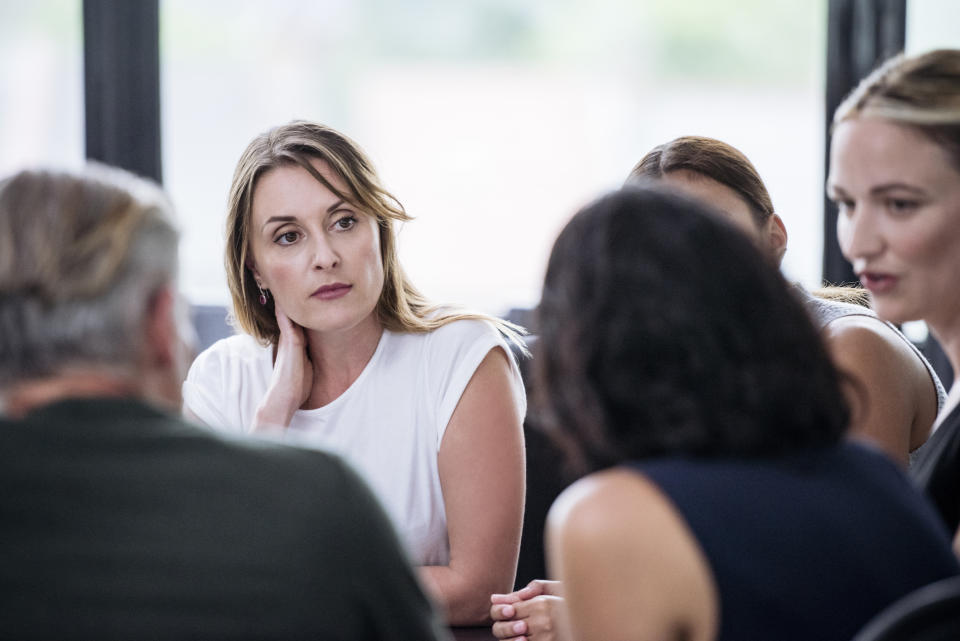 Woman in a meeting at work. (Getty Images)