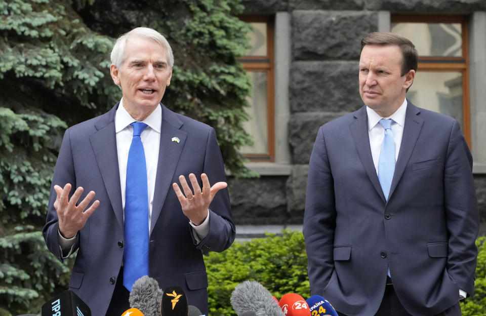 U.S. Senator U.S. Senator Rob Portman, R-Ohio, left, speaks as U.S. Senator Chris Murphy D-Conn., looks on during a briefing at Ukrainian Presidential office after their meeting with Ukrainian President Volodymyr Zelenskiy in Kyiv, Ukraine, Wednesday, June 2, 2021. (AP Photo/Efrem Lukatsky)