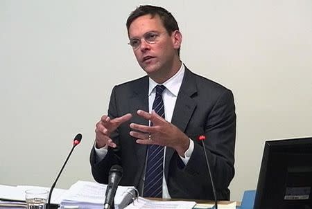 A still image from broadcast footage shows News Corp Deputy Chief Operating Officer, James Murdoch, speaking at the Leveson Inquiry into the culture, practices and ethics of the media at the High Court in London April 24, 2012. REUTERS/POOL via Reuters TV/Files