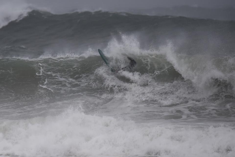 A file picture of large surf. Source: AAP/Mick Tsikas