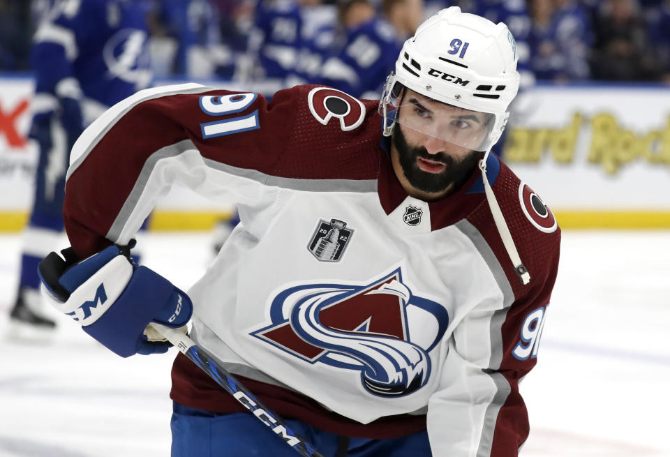 Nazem Kadri #91 of the Colorado Avalanche attends warm ups before playing in Game Four of the 2022 NHL Stanley Cup Final against the Tampa Bay Lightning