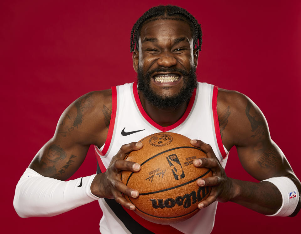 Portland Trail Blazers center Deandre Ayton poses for a portrait during the NBA basketball team's media day in Portland, Ore., Monday, Oct. 2, 2023. (AP Photo/Craig Mitchelldyer)