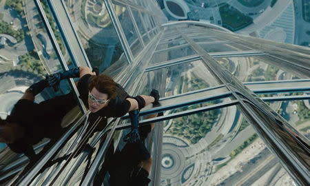 tom cruise scales dubai building in 'mission impossible: ghost protocol'.