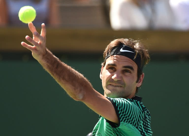 Roger Federer of Switzerland serves against Jack Sock of the United States during his semi final match during day thirteen of the BNP Paribas Open at Indian Wells Tennis Garden on March 18, 2017