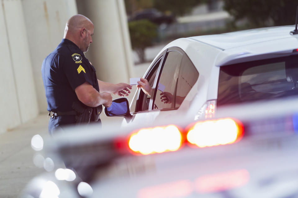 cop giving a ticket