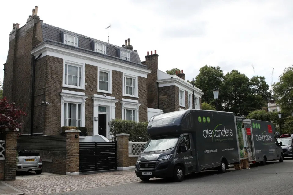 Removal men are seen carrying boxes from Simon Cowell’s London mansion, which he sold for around $16 million last year. Raw Image LTD/MEGA