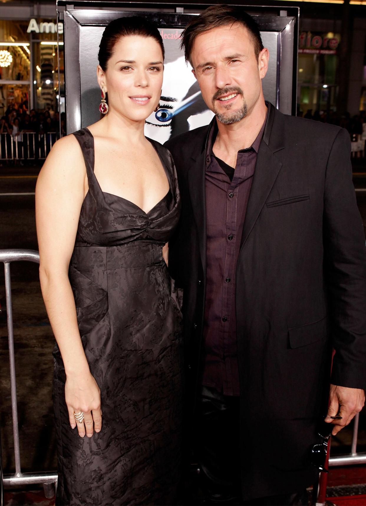 Neve Campbell (L) and David Arquette arrive at the "Scream 4" World Premiere at Grauman's Chinese Theatre on April 11, 2011 in Hollywood, California