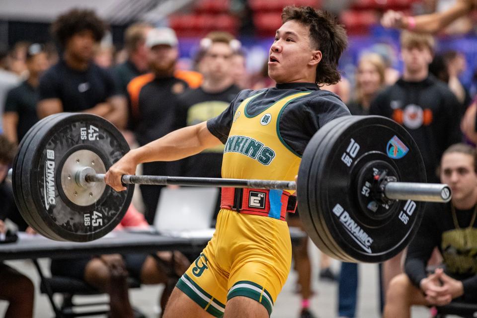 George Jenkins High School William Draper makes a lift during the 3A State Weightlifting Championship at the RP Funding Center in Lakeland on Friday.
