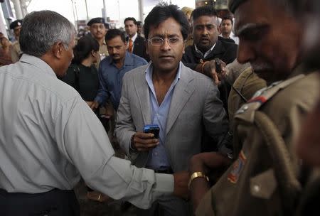 Lalit Modi, former chairman of Indian Premier League (IPL), leaves an airport in New Delhi April 28, 2010. REUTERS/Adnan Abidi/Files