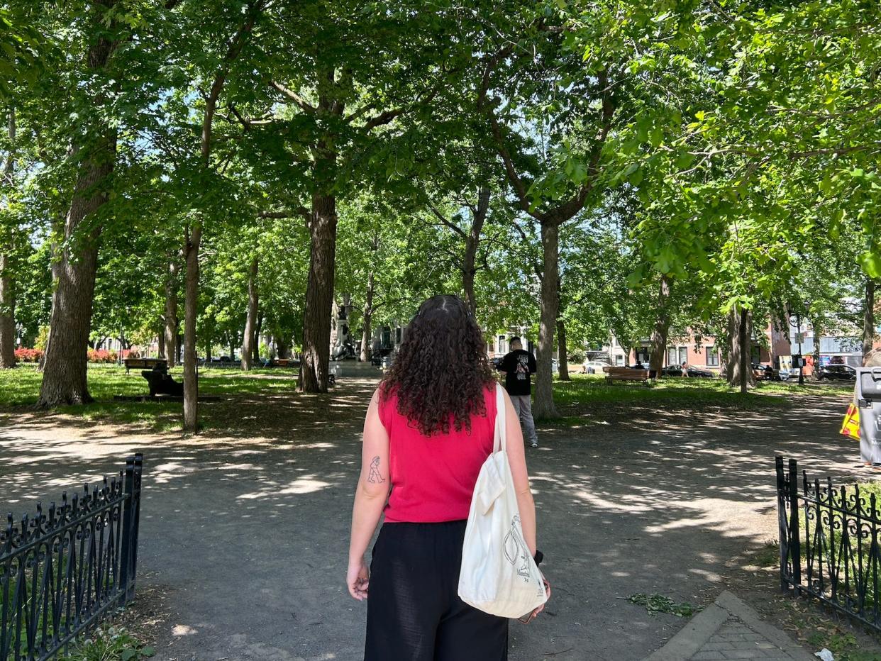 mira looking out over st louis square park in montreal