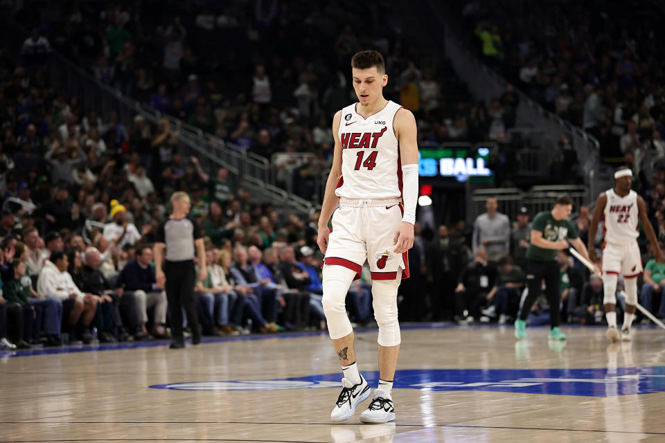 MILWAUKEE, WISCONSIN - APRIL 16: Tyler Herro #14 of the Miami Heat walks backcourt during the first half of Game One of the Eastern Conference First Round Playoffs against the Milwaukee Bucks at Fiserv Forum on April 16, 2023 in Milwaukee, Wisconsin. NOTE TO USER: User expressly acknowledges and agrees that, by downloading and or using this photograph, User is consenting to the terms and conditions of the Getty Images License Agreement. (Photo by Stacy Revere/Getty Images)