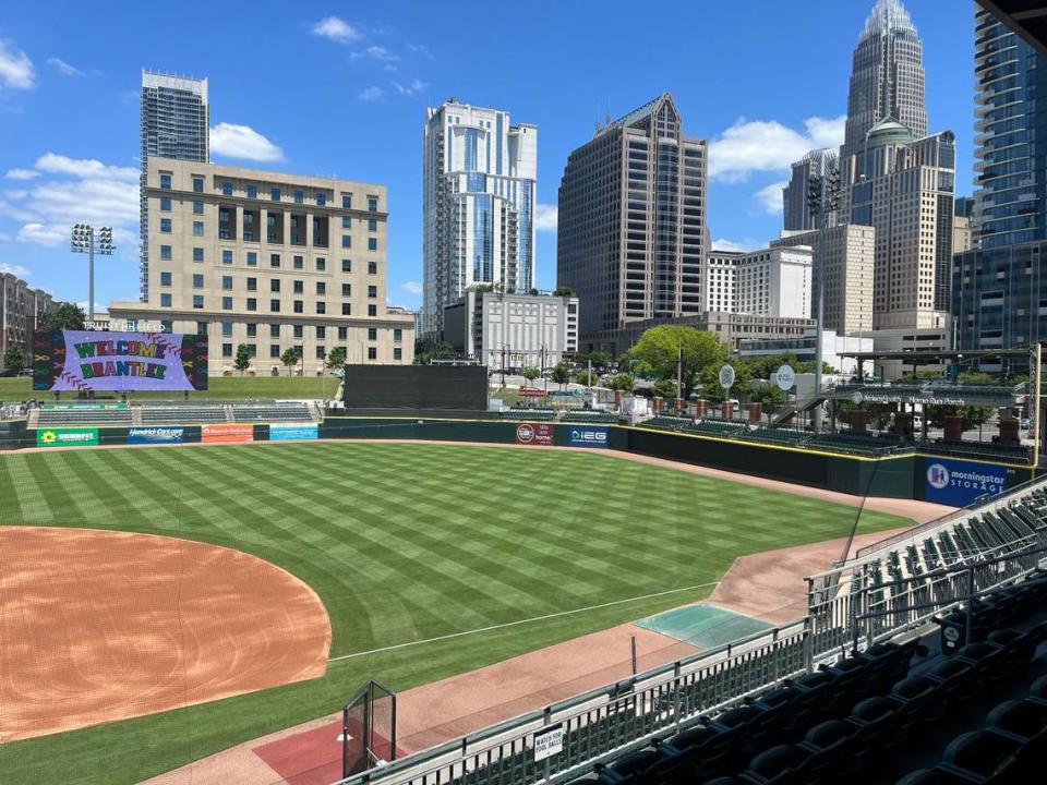 In the colors of the Charlotte Knights jerseys he designed, 11-year-old Brantlee Mumford gets a warm welcome to Truist Field in Charlotte, N.C., on June 21, 2024.