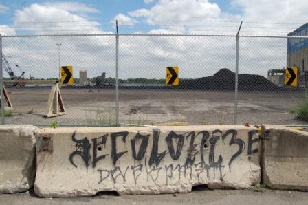A dwindling pile of petcoke near W. Jefferson and S. Clark in Detroit awaits the next leg of its journey after making its way from the oil sands of Alberta to the oil refinery of Detroit. Where to next...? 