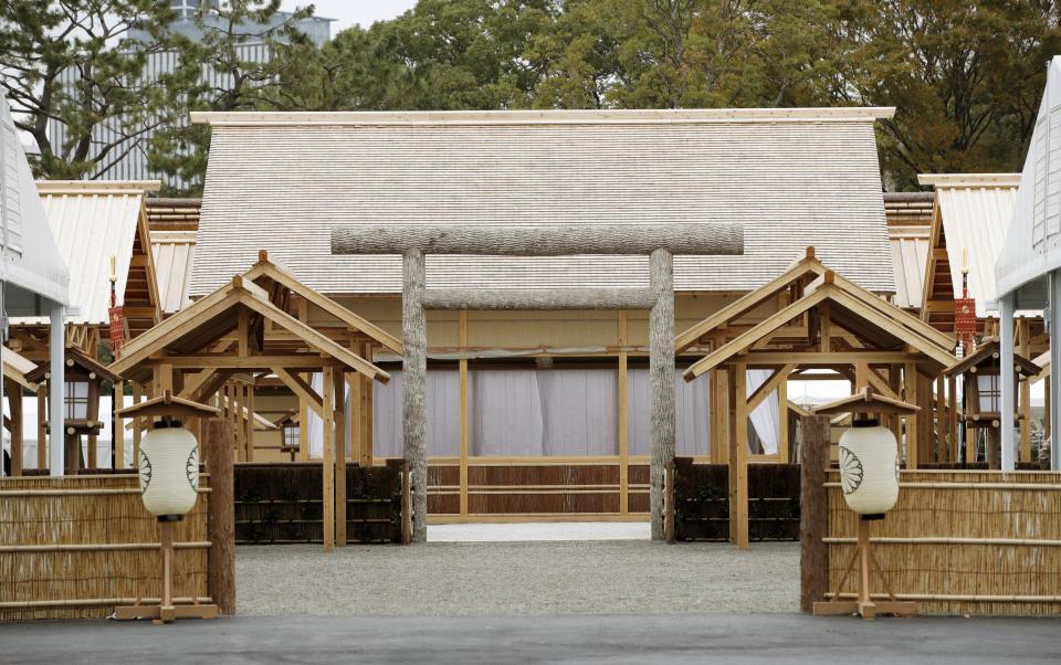 The ritual venue called Daijokyu is seen at the Imperial Palace in Tokyo, Wednesday, Nov. 13, 2019. Japan’s Emperor Naruhito will perform his first harvest ritual since ascending to the Chrysanthemum Throne on Nov. 14, 2019. It’s called Daijosai, or great thanksgiving festival, the most important imperial ritual that an emperor performs only once in his reign. (Fumine Tsutabayashi/Kyodo News via AP)