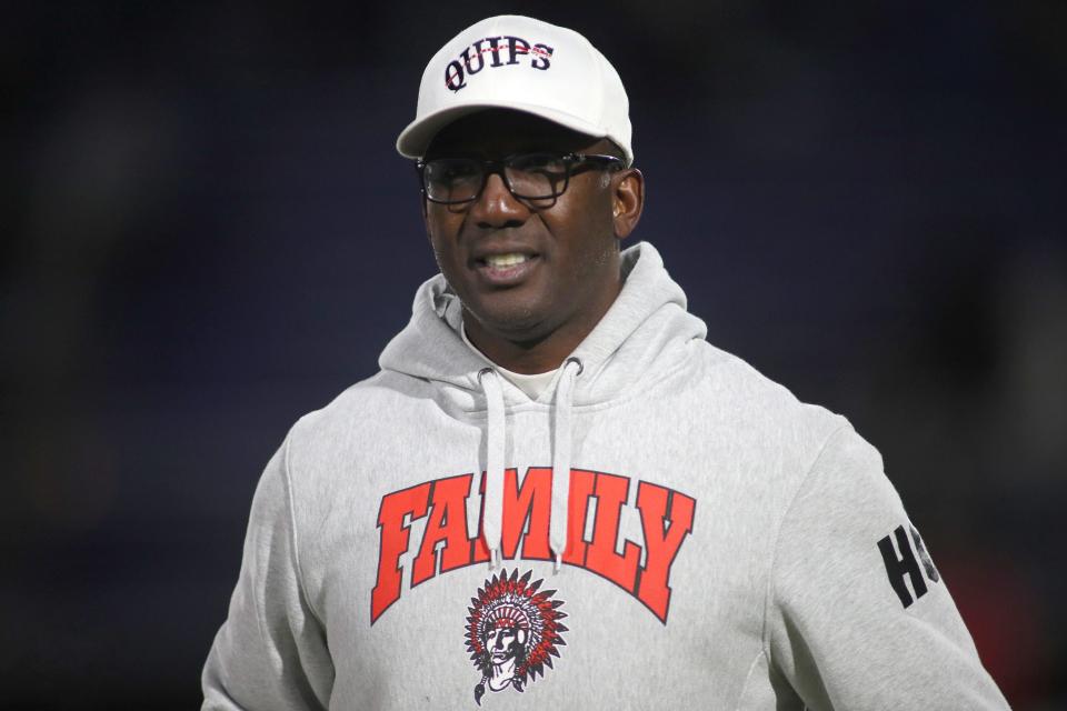 Aliquippa Head Coach Mike Warfield walks off the field after defeating McKeesport 27-21 in overtime and claiming their spot in the WPIAL 4A Championship game at Heinz Field.