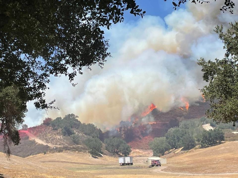 The Camino Fire burns in the hills near Huasna on Tuesday, June 28, 2022, according to Cal Fire. The fire has the potential to reach 1,500 acres.