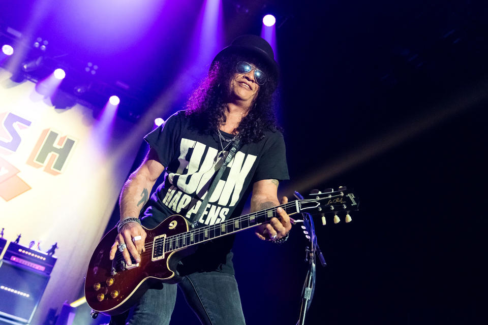 LONDON, ENGLAND - APRIL 05: Slash performs with Myles Kennedy and The Conspirators at OVO Arena Wembley on April 05, 2024 in London, England. (Photo by Matthew Baker/Getty Images)