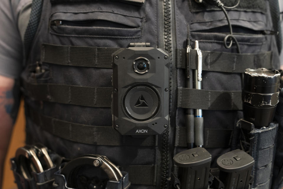 An Axon body camera is worn by an officer at Oklahoma City police headquarters on Friday, May 31, 2024 in Oklahoma City, Oklahoma. (AP Photo/Nick Oxford)