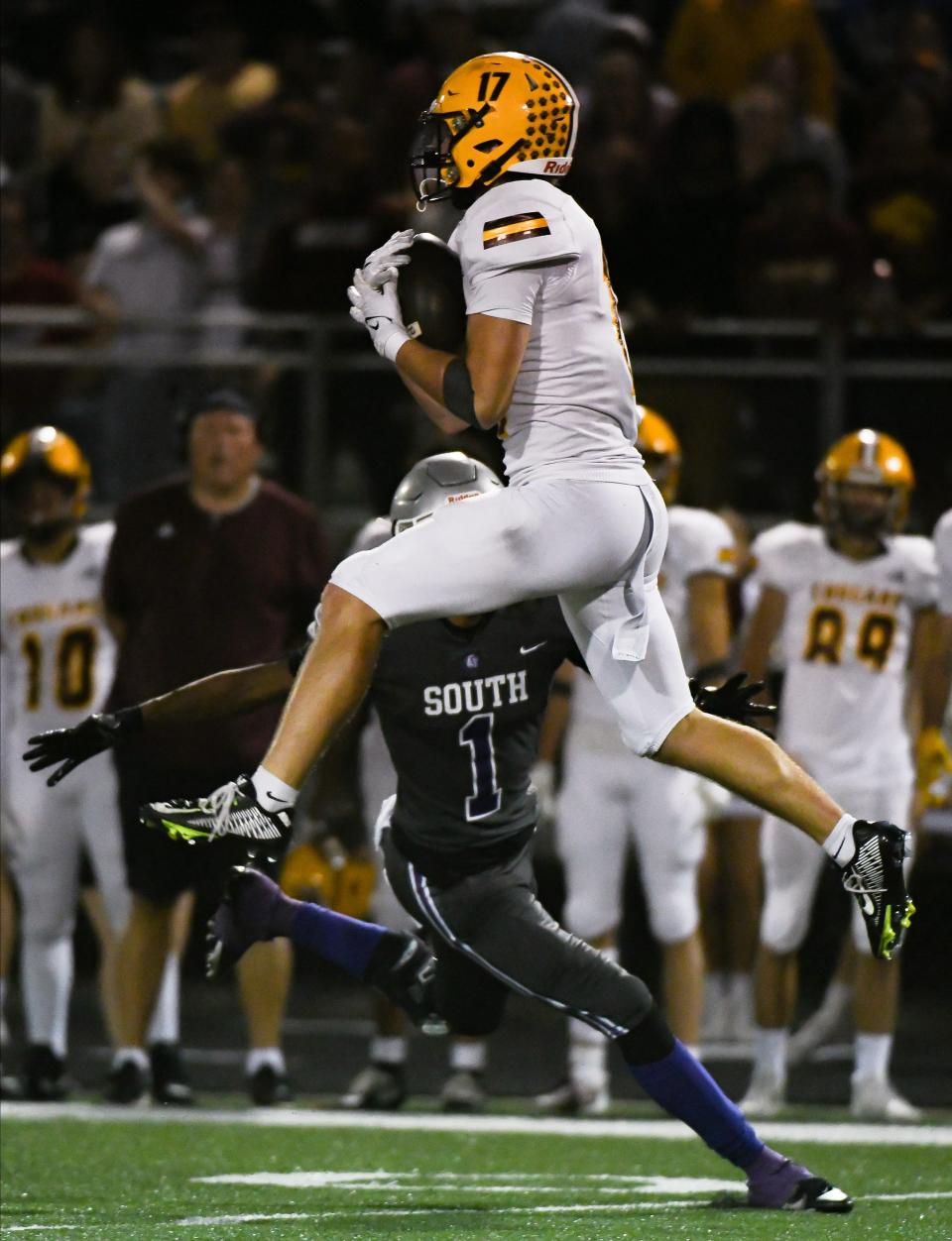 Bloomington North’s Graham Freund (17) intercepts a pass in the fourth quarter during the North-South football game at South on Friday, September 8, 2023.