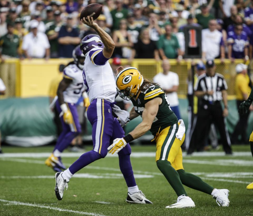 Green Bay’s Clay Matthews was penalized for this hit on Minnesota quarterback Kirk Cousins in Week 2. (AP)