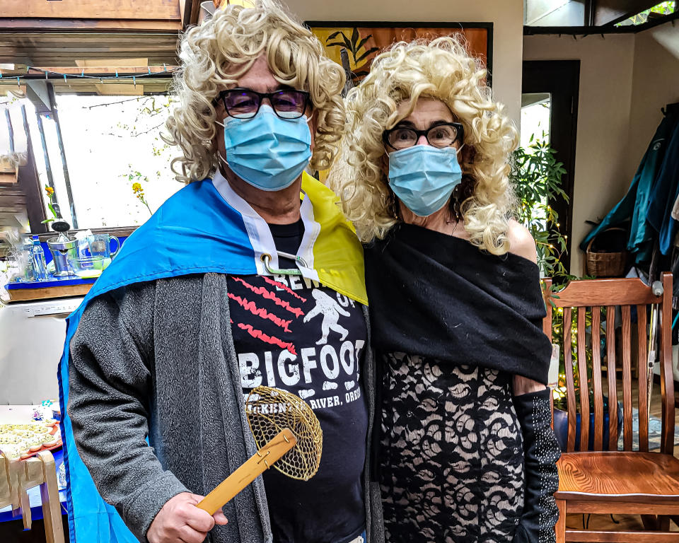 The author and her husband in blond wigs. They dressed up in fun to celebrate the life of a friend after her recent cancer diagnosis.
 (Courtesy of Cai Emmons)