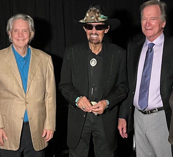 Richard Petty, center, with Mike Curb, left, and Gary Baker, right, was inducted into the Nashville Fairgrounds Speedway Hall of Fame Tuesday night. Baker and Curb owned Baker Curb Racing and Petty was on that team.