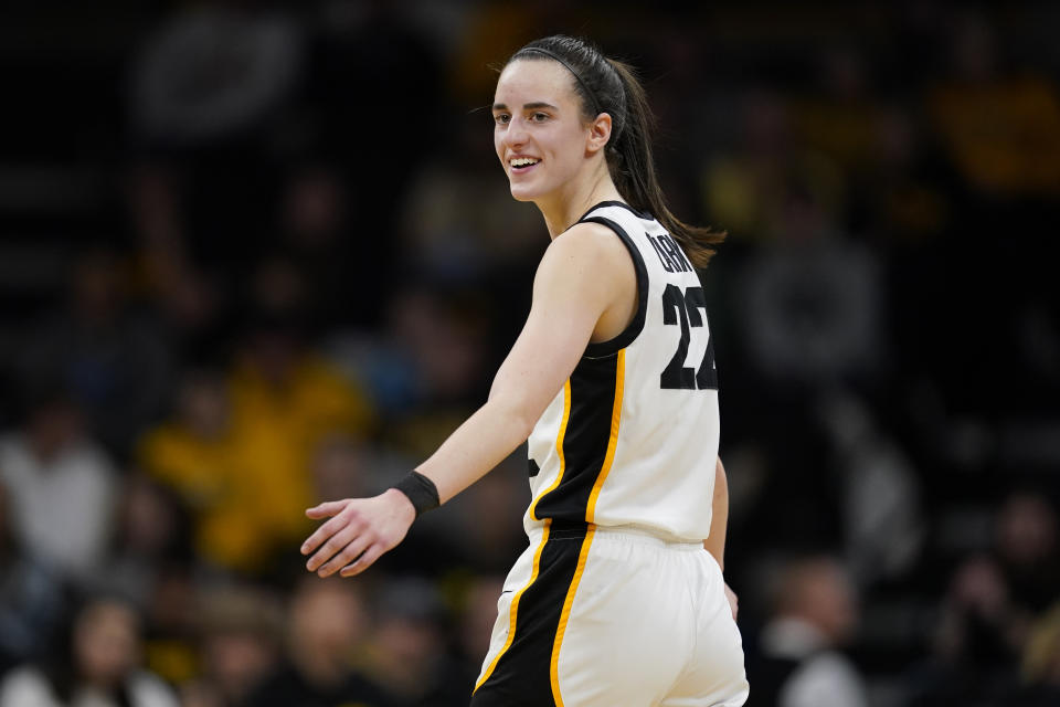 Iowa guard Caitlin Clark reacts during the second half of an NCAA college basketball game against Maryland, Thursday, Feb. 2, 2023, in Iowa City, Iowa. Iowa won 96-82. (AP Photo/Charlie Neibergall)