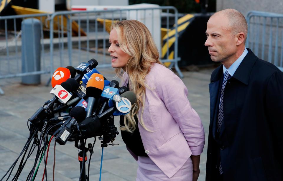 FILE PHOTO: Porn star Stormy Daniels, whose real name is Stephanie Clifford, speaks to media along with lawyer Michael Avenatti (R) outside federal court in the Manhattan borough of New York City, New York, U.S., April 16, 2018. REUTERS/Lucas Jackson/File Photo