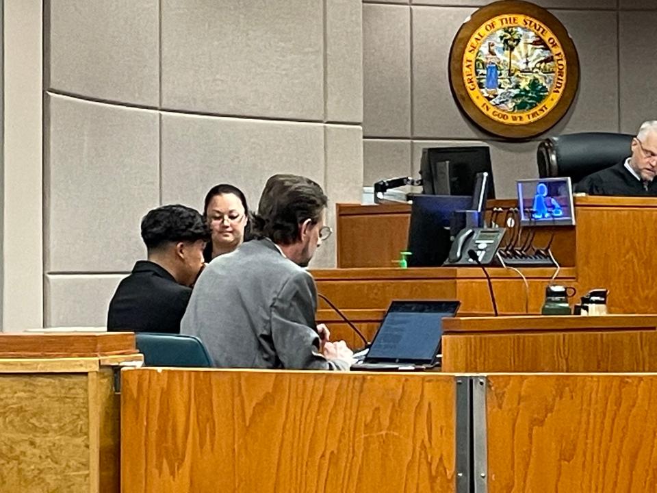 Lawyer David Mengers and his client, Carlos Flores-Renteria, at trial.