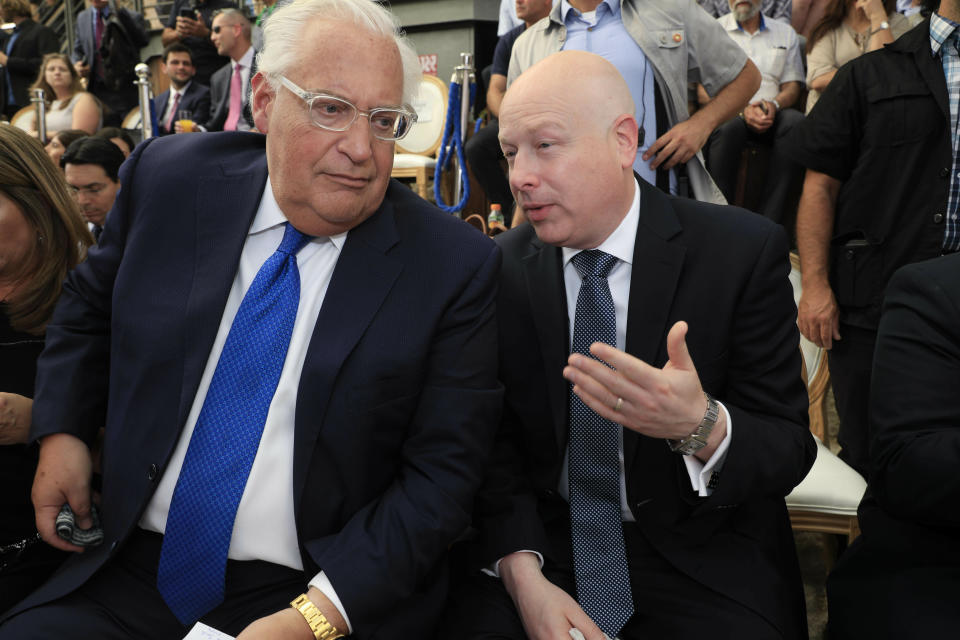 U.S. Ambassador to Israel David Friedman, left, and White House Mideast envoy Jason Greenblatt attend the opening of an ancient road at the City of David, a popular archaeological and tourist site in the Palestinian neighborhood of Silwan in east Jerusalem. The site is located on what many believe to be the ruins of the biblical King David's ancient capital and see as centerpieces of ancient Jewish civilization, but critics accuses the operators of pushing a nationalistic agenda at the expense of local Palestinian residents. (AP Photo/Tsafrir Abayov, Pool)