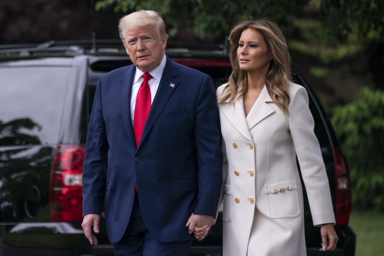 WASHINGTON, DC - MAY 25: U.S. President Donald Trump and first lady Melania Trump depart the White House for Baltimore, Maryland on May 25, 2020 in Washington, DC. The Trumps will attend a Memorial Day ceremony at the Fort McHenry National Monument and Historic Shrine despite objections by Baltimore Mayor Bernard C. “Jack” Young, whose residents remain under a stay-at-home order due to the coronavirus. (Photo by Sarah Silbiger/Getty Images)