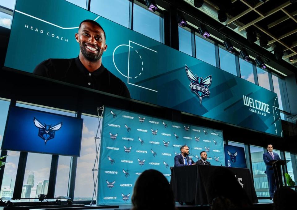 The new Charlotte Hornets coach Charles Lee and Jeff Peterson, Executive Vice President Of Basketball Operations, speak during a press conference in Charlotte, N.C., on Tuesday, June 25, 2024.