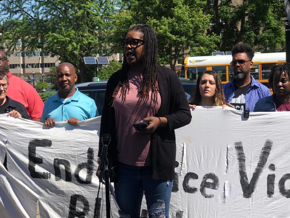 Khalilah Collins, a social worker and project manager for Diverse Options: Voice and Empowerment (DOVE) Delegates, speaks at a press conference May 10, 2023.