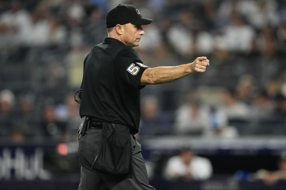 Hope Plate umpire Dan Iassogna warns the Baltimore Orioles dugout after New York Yankees relief pitcher Wandy Peralta hit Orioles' Colton Cowser with a pitch during the eighth inning of a baseball game Thursday, July 6, 2023, in New York. (AP Photo/Frank Franklin II)