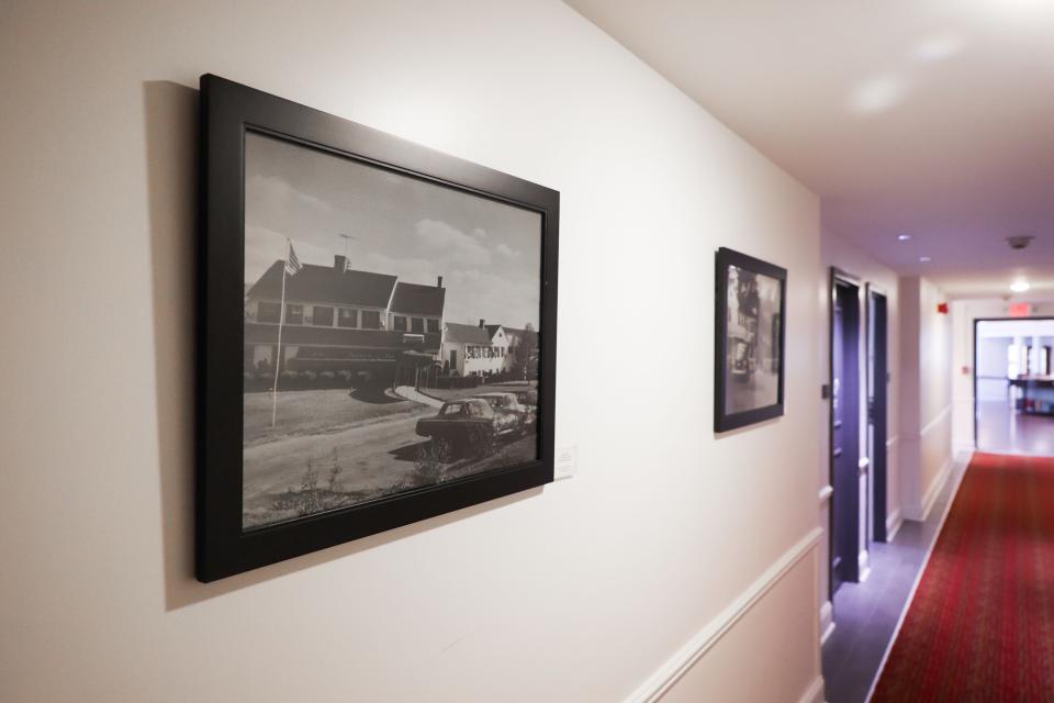 The Aurora Historical Society provided historic photographs of the Aurora Inn and surrounding area that line the inn's hallways.