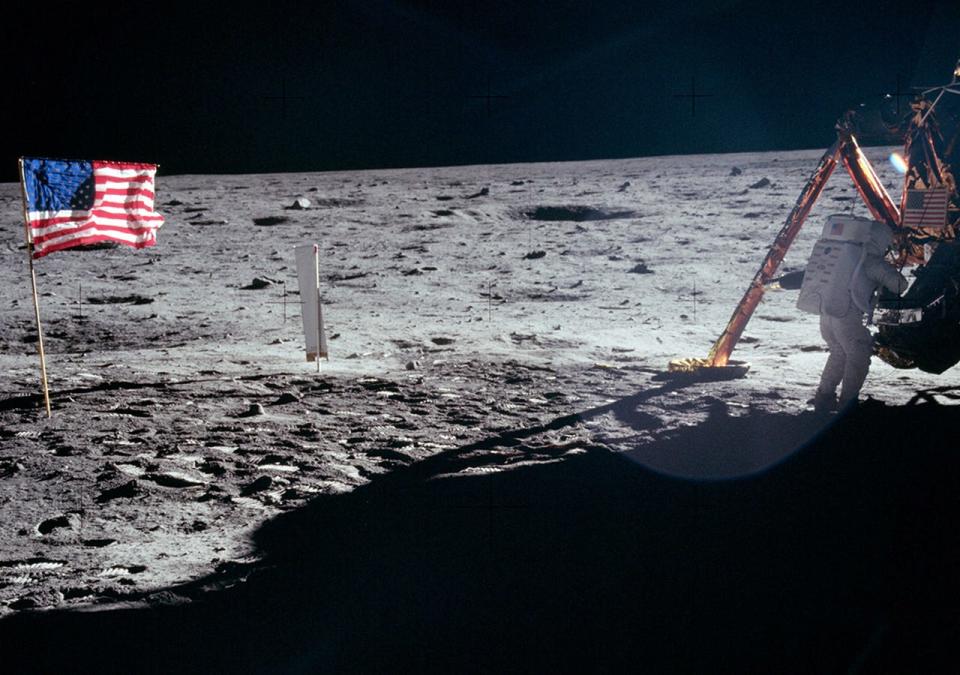 Apollo 11 astronaut Neil Armstrong, the first person to set foot on the Moon, stands near the Lunar Module (LM) "Eagle" in July 1969.