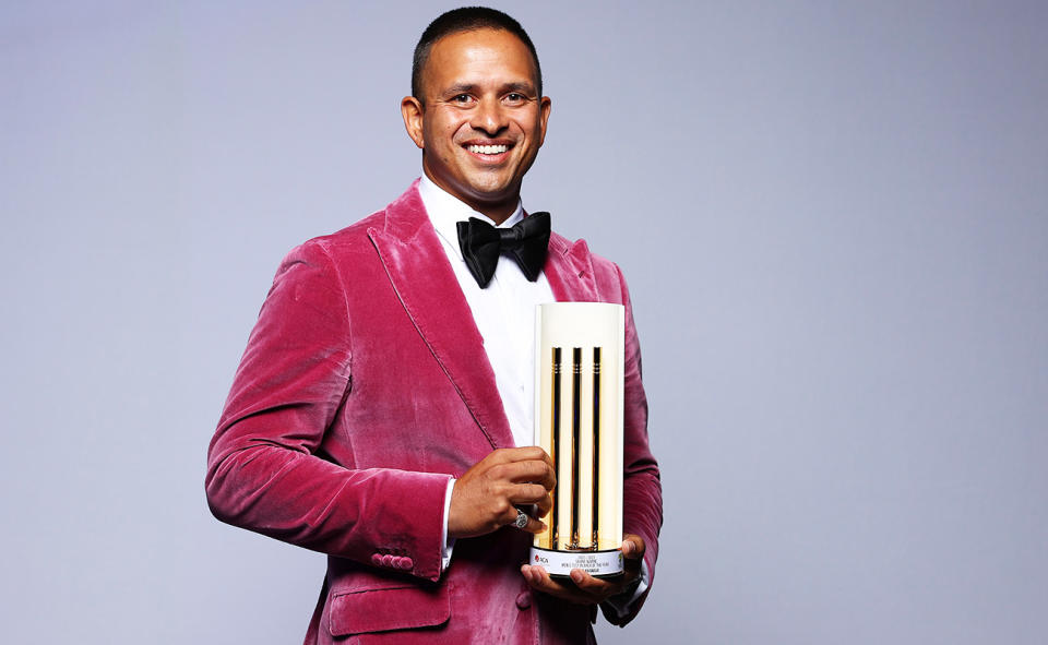 Usman Khawaja, pictured here with the Shane Warne men's Test player of the year award.