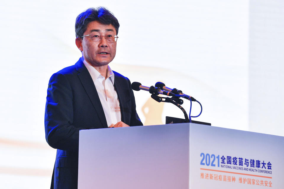 Gao Fu, director of the China Centers for Disease Control, speaks at the National Vaccines and Health conference in Chengdu in southwest China's Sichuan province Saturday, April 10, 2021. In a rare admission of the weakness of Chinese coronavirus vaccines, Gao the country's top disease control official says their effectiveness is low and the government is considering mixing them to give them a boost. (Chinatopix Via AP)