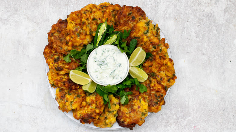 corn and jalapeño fritters on platter