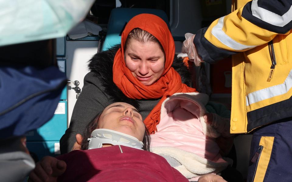 Hulya Yilmaz and her baby Ayse Vera are rescued under the rubble of a collapsed building after 29 hours of 7.7 and 7.6 magnitude earthquakes hit Hatay - Anadolu