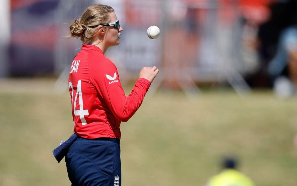 Charlie Dean prepares to deliver a ball during the Group B T20 women's World Cup cricket match between West Indies and England at Boland Park in Paarl on February 11, 2023 - MARCO LONGARI/AFP via Getty Images