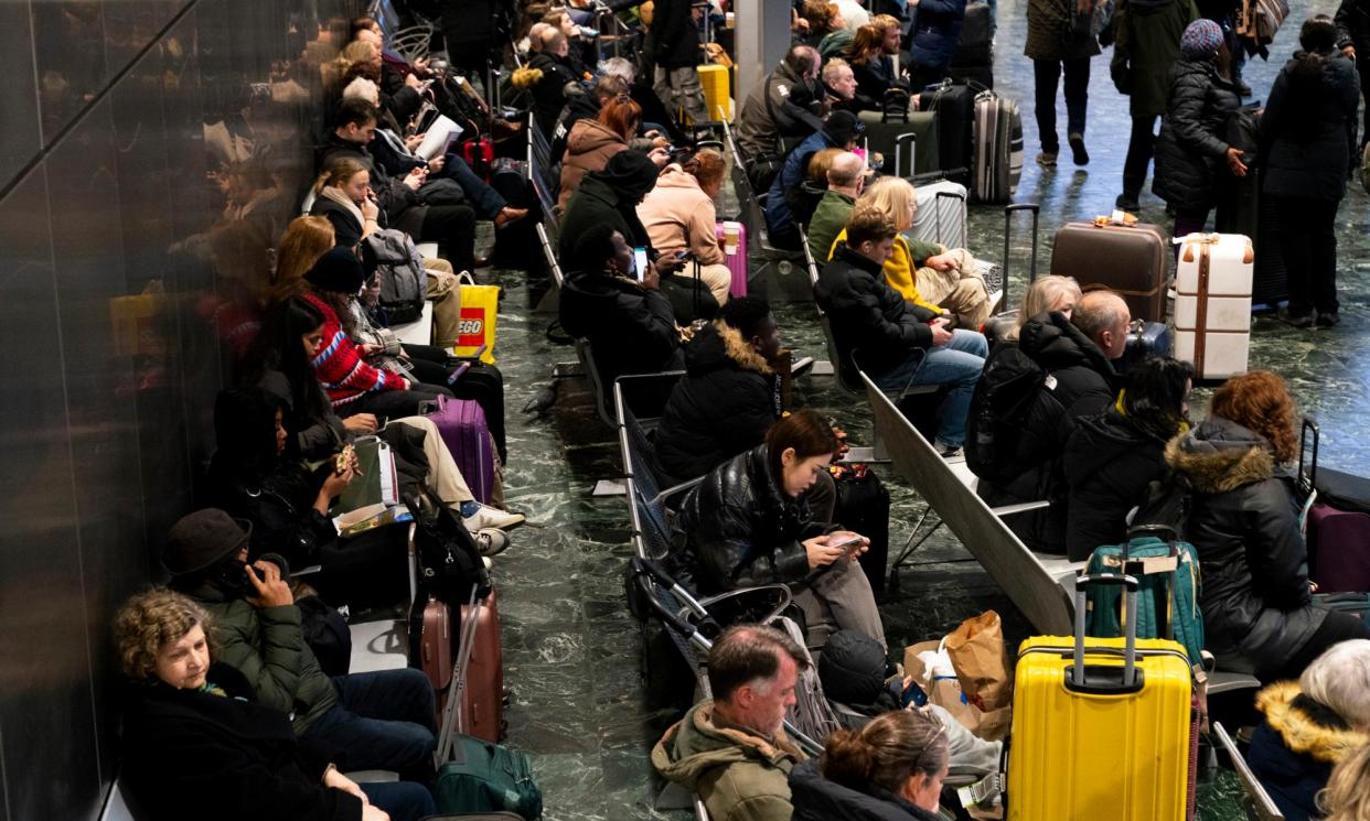 <span>Passengers at Euston station in London during service disruption caused by Storm Isha in January.</span><span>Photograph: Jordan Pettitt/PA</span>