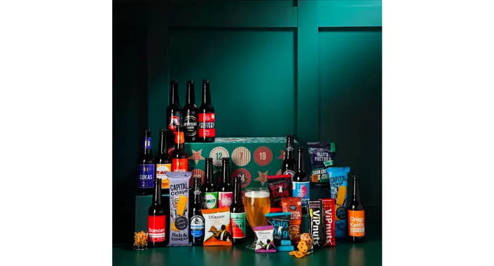 John Lewis' Beer Advent Calendar comes with 14 glass bottles of beer and 10 snacks. (John Lewis)