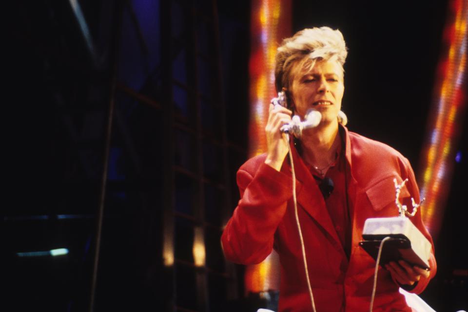 David Bowie performs during the Glass Spider Tour at the St. Paul Civic Center in St. Paul, Minnesota on October 1, 1987. (Photo by Jim Steinfeldt/Michael Ochs Archives/Getty Images) 